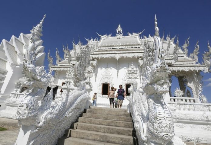 <br />
A picture made available on 25 December 2012 shows Wat Rong Khun, a temple in Chiang Rai province, northern Thailand, 07 December 2012. Wat Rong Khun will build separate toilets for Thais and other non-Chinese tourists. EPA/NARONG SANGNAK