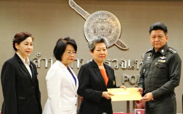 Representatives of Thai Nurse Association file a complaint with police over a nightclub that published an advertisement featuring waitresses in "sexy nurse" costumes, 6 March 2015.