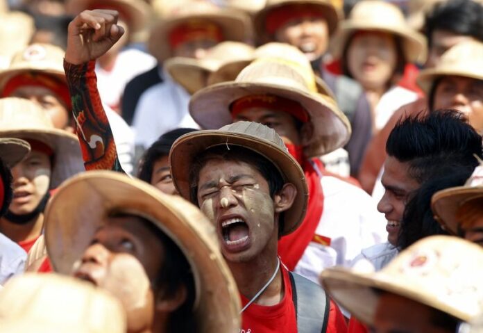 Student protesters shout slogans at a demonstration in Letpadan, Bago division, about 145 kilometres north of Yangon, Myanmar, on March 10, 2015. Students from universities across Myanmar are protesting an education bill being debated in parliament. EPA/NYEIN CHAN NAING<br />
