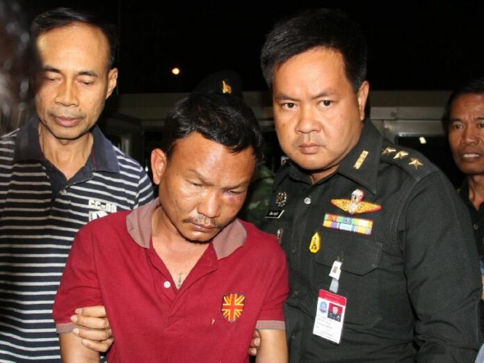 A suspect arrested in connection with the grenade attack on the Criminal Court house in Bangkok on 7 March 2015.