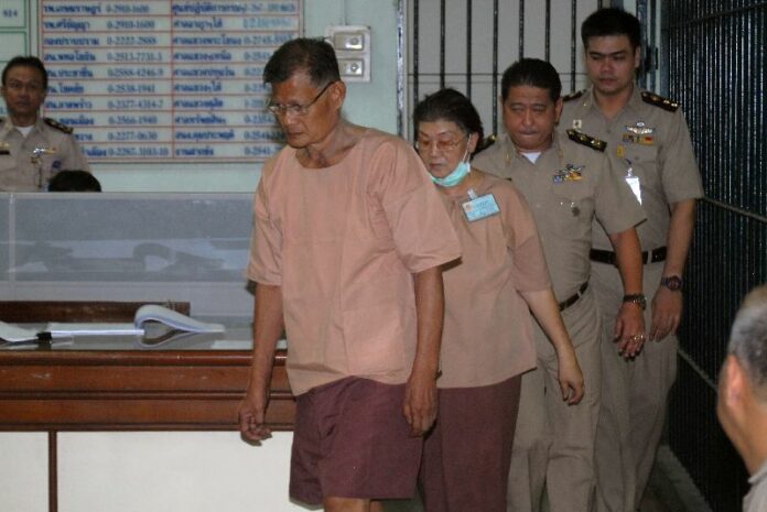 Apiruj and Wantanee Suwadee arrive at the Criminal Court in Bangkok on 11 March 2015.<br />