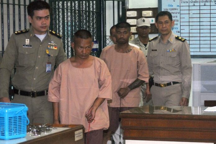 Mahahin Khunthong and Yutthana Yenpinyo at the criminal court in Bangkok today, 17 March 2015.