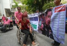 Disabled Lotto Sellers Rally Against Proposed Ticket Machines