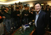 Prayuth Promises Not to Arrest Thaksin at Lee Kuan Yew's Funeral