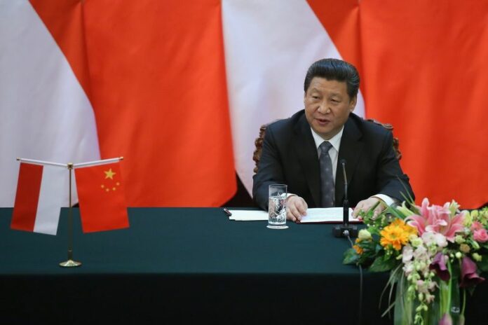 Chinese President Xi Jinping during a press conference with Indonesian President Joko Widodo (unseen) in the Great Hall of the People in Beijing, China, 26 March 2015. EPA/FENG LI / POOL<br />