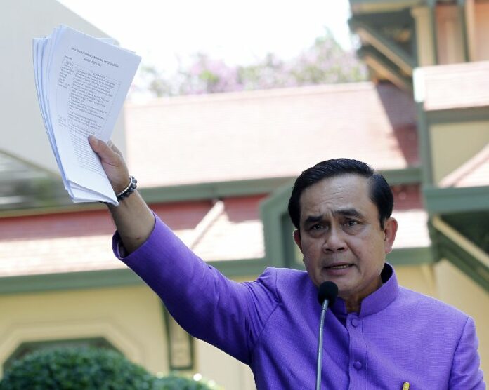 Gen. Prayuth Chan-ocha speaking to reporters at the Government House on 31 March 2015.<br />