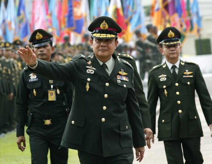 Thai Prime Minister Prayuth Chan-ocha at Thai army headquarters in Bangkok on September 30, 2014. Thailand's military government on Tuesday received permission to lift martial law from King Bhumibol and have done so. EPA/NARONG SANGNAK<br />