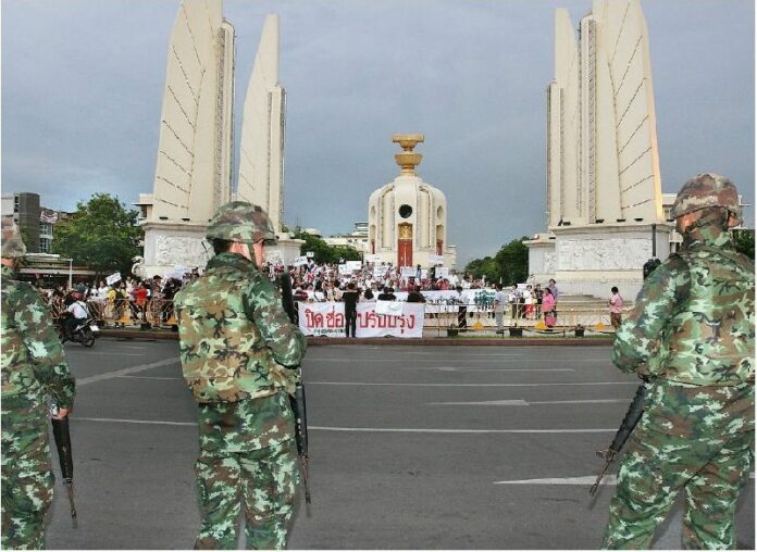 A pro-coup rally at Democracy Monument, which was built in 1939 to commemorate the first constitution of Thailand, June 2014.