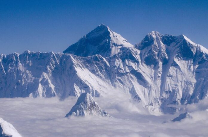 A file photo dated 14 September 2013 shows 8,848 m (29,028 feet) high Mount Everest, seen from an aircraft over Nepal. One year after an avalanche killed 16 Sherpas on Mount Everest and ended the climbing season, mountaineers are scrambling toward the world's highest peak once again. EPA/NARENDRA SHRESTHA