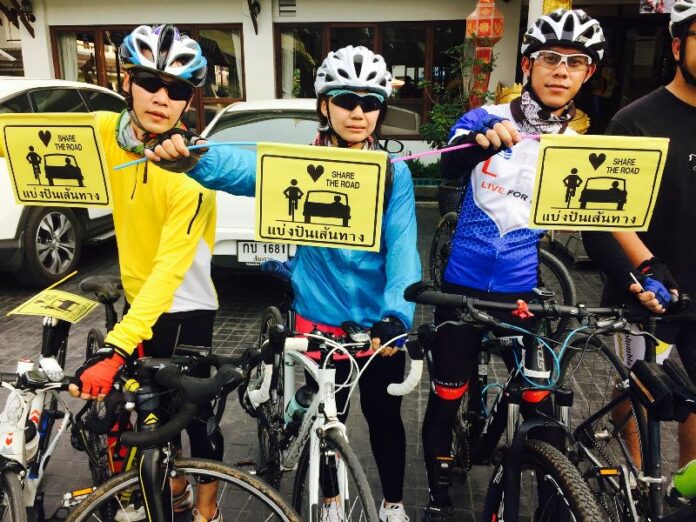 More than 200 people gathered in front of a hotel in Chiang Rai province and held a brief rally urging increased safety for cyclists, 4 May 2015.