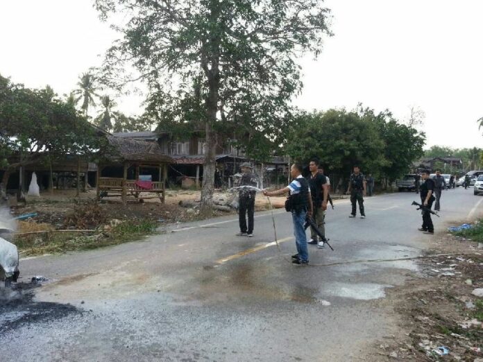 The scene where two civilians were shot and burned in their car in Yala province on 6 May 2015.