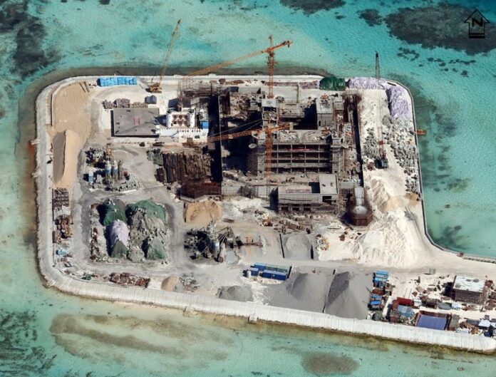 A handout picture made available by the Armed Forces of the Philippines (AFP) Public Affairs Office April 20 shows construction at Chigua (Kennan) Reef in the disputed Spratley Islands in the south China Sea by China on February 19. EPA/ARMED FORCES OF THE PHILIPPINES<br />