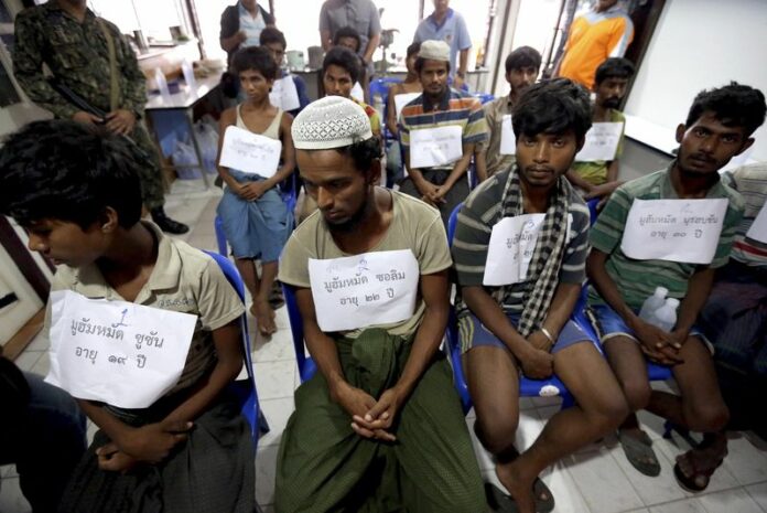 Suspected ethnic Rohingya migrants, who were rescued by Thai officials from a jungle, are detained at the city hall in the Thai-Malaysian border district of Hat Yai, Songkhla province 7 May 2015. EPA/STR