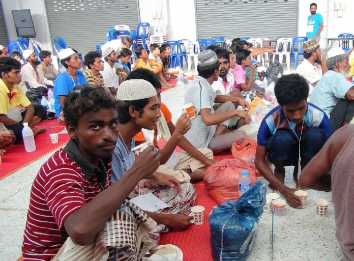 Rohingya and Bangladeshi migrants are processed by authorities in Songkhla province on 10 May 2015.<br />