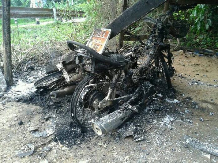 One of six motorcycles set on fire in Yala province on 12 May 2015.