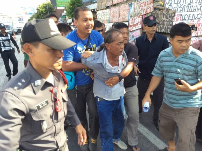 Khantichai Kampha, 63, arrested by police for driving a truck with controversial banners in Hua Hin, 13 May 2015.