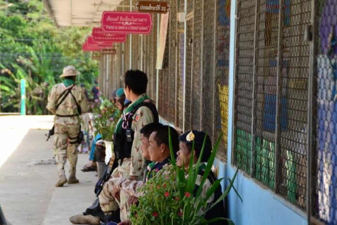 Security officers stationed at a school in Yala province to prevent insurgent attacks, 13 May 2015.<br />