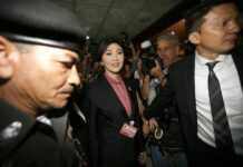 Yingluck Appears in Court on First Day of Criminal Trial