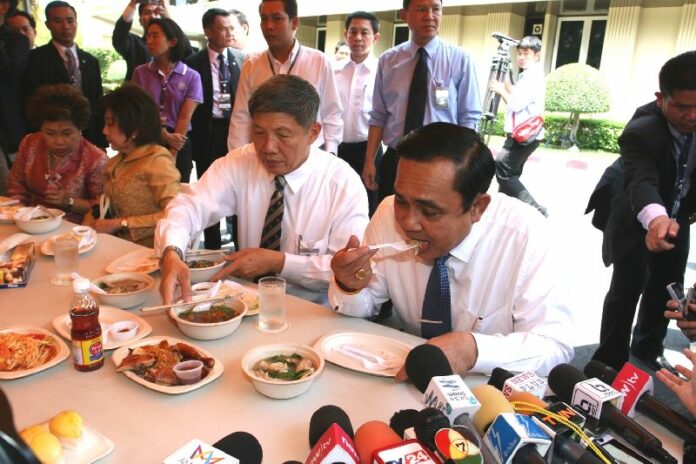 Gen. Prayuth eating with reporters at the Government House in Bangkok, 28 May 2015.