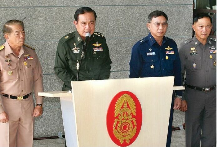 Gen. Prayuth Chan-ocha, who was serving as army chief at the time, speaks at a press conference on 20 May 2014, two days before he seized power from the government.