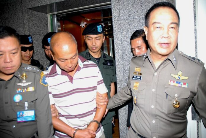 Montri Sotangkul, a former senior assistant to ex-Princess Srirasmi Suwadee, arriving at the police headquarters in Bangkok on 11 June 2015.