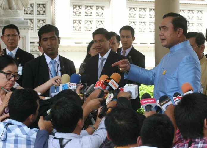Gen. Prayuth Chan-ocha speaking to reporters at Government House in Bangkok, 4 June 2015