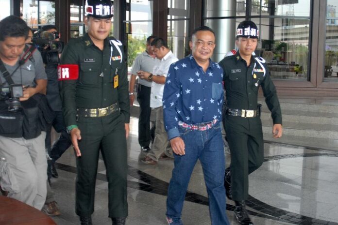 Redshirt leader Jatuporn Prompan arriving at the Army club for a discussion with military officers on 18 June 2015.