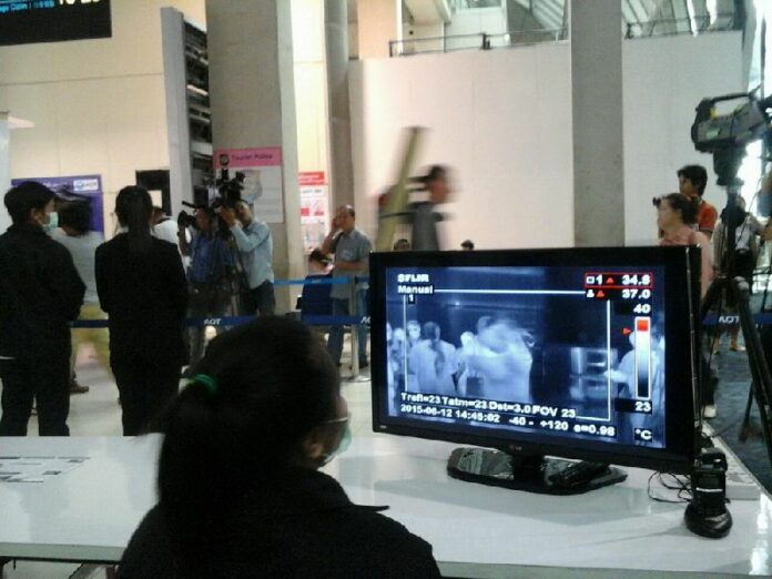 Suvarnabhumi Airport officials show reporters a thermal scan used to detect viruses like MERS, 12 June 2015.
