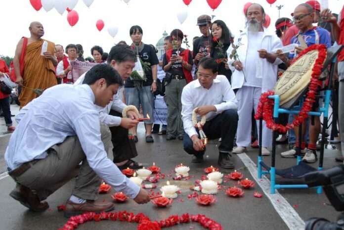 Redshirt activists commemorate the anniversary of the 1932 revolution at the Royal Plaza in Bangkok on 24 June 2013.