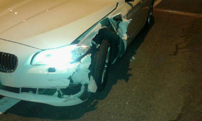 The BMW that crashed into a police officer who was riding a motorcycle in Bangkok on 28 June 2015.