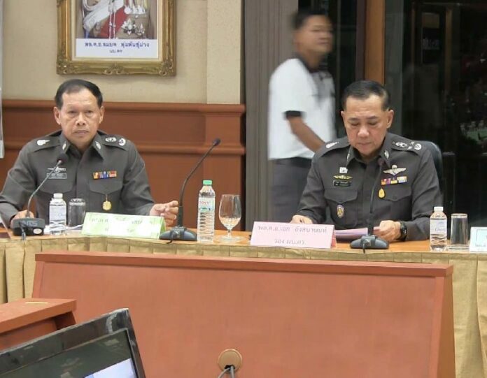 Pol.Gen. Aek Angsananont (R), deputy chief of Royal Thai Police, speaking to reporters on 29 June 2015.