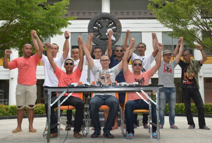 Fourteen activists facing trial in military court hold a press conference vowing to continue their fight for democracy, 9 July 2015.