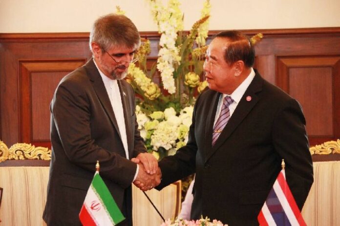Iranian ambassador Hossein Kamalian meets with Thai Defense Minister Prawit Wongsuwan at the Government House in Bangkok, 14 May 2015.