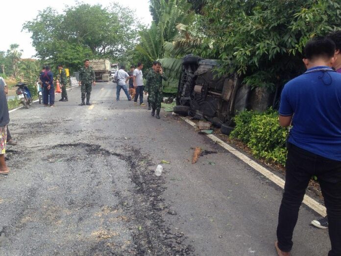 The flipped Volvo that police said was carrying a robbery suspect in Pathum Thani, 16 July 2015.