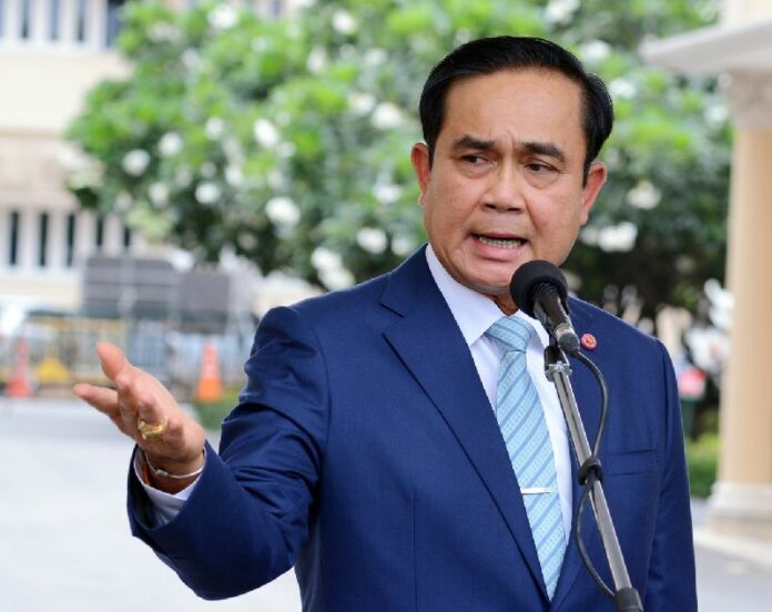 Thailand's junta is chaired by Gen. Prayuth Chan-ocha, pictured here speaking to reporters at Government House in Bangkok on 9 July 2015