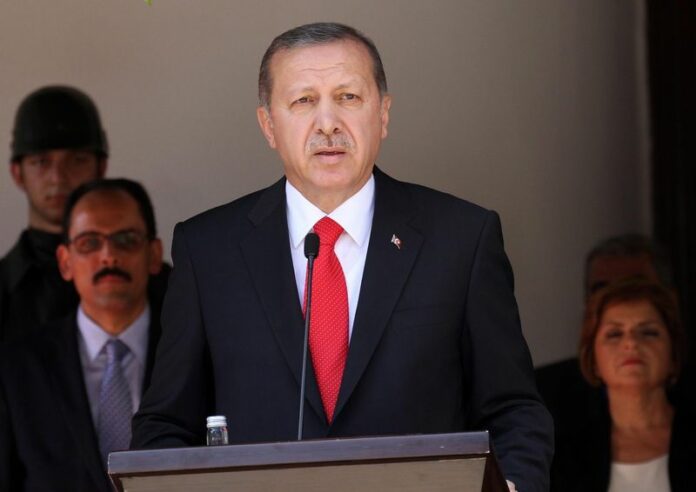 Turkish President Recep Tayyip Erdogan gives a press conference in Turkish-occupied Nicosia, Cyprus. EPA/STRINGER<br />
