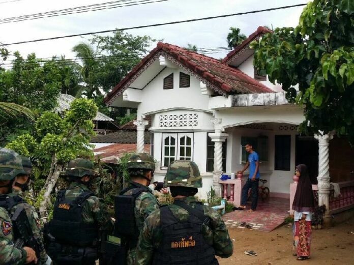Marines raid the home of a Muslim woman near the scene where a roadside bomb struck a convoy, killing one soldier today in the south of Thailand.