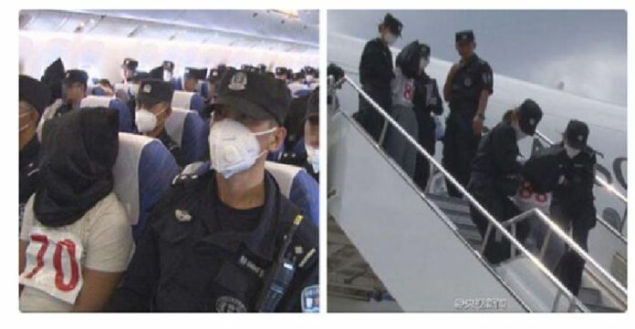 A group of more than 90 Uighur refugees were forcibly repatriated from Thailand to China in July. Chinese security forces placed hoods over their heads for the flight to China, where they are branded terrorists. Photo: CCTV