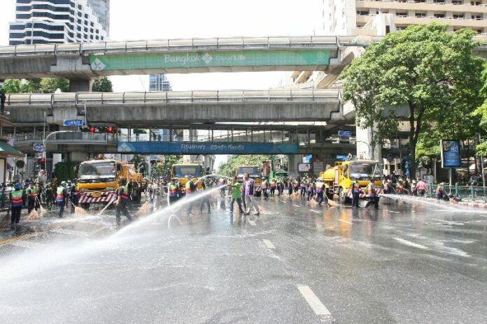 A small army of city workers power washed the scene of Monday night's crime on Tuesday morning.