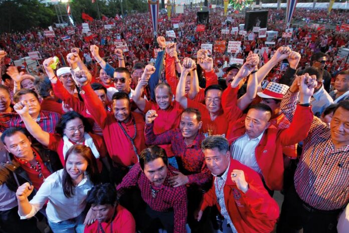Redshirt leaders at a rally in support of the civilian government in western Bangkok in this 10 May, 2014, file photo.