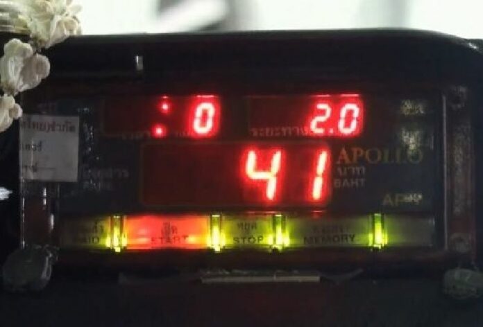 Taxi driver Sawai Meepian is accused of jacking up fares with a hidden button near his turn signal.