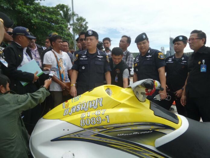 Crime Suppression Division director Maj. Gen. Akaradech Pimonsri, at center, speaks to the media today in Pattaya along with other CSD officers.