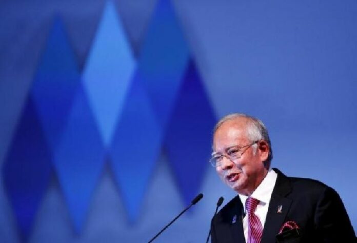 Malaysian Prime Minister Najib Razak speaks at the World Capital Market Symposium in Kuala Lumpur, Malaysia, on 3 Sept. Photo: Reuters / Olivia Harris
