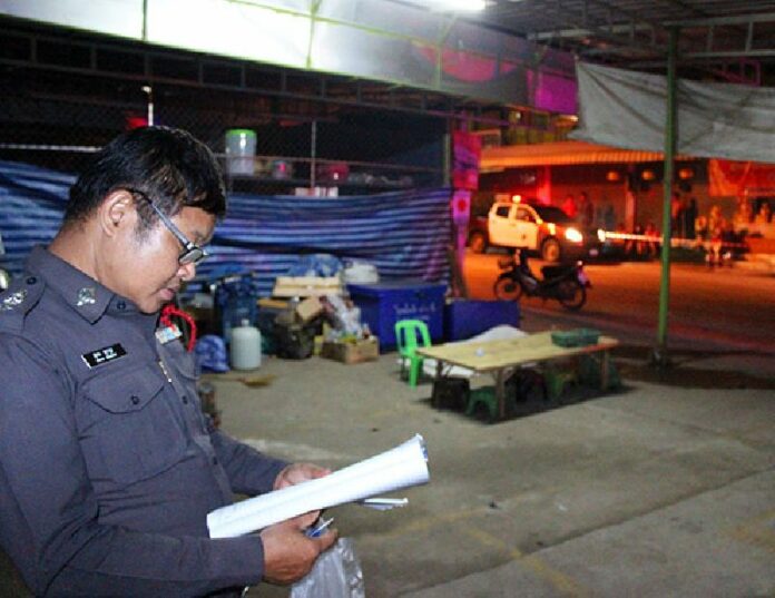 Korat Police Lt. Col. Supol Surawut stands near the scene where a 27-year-old man, who had until recently been in prison since age 18, killed himself with a homemade bomb.