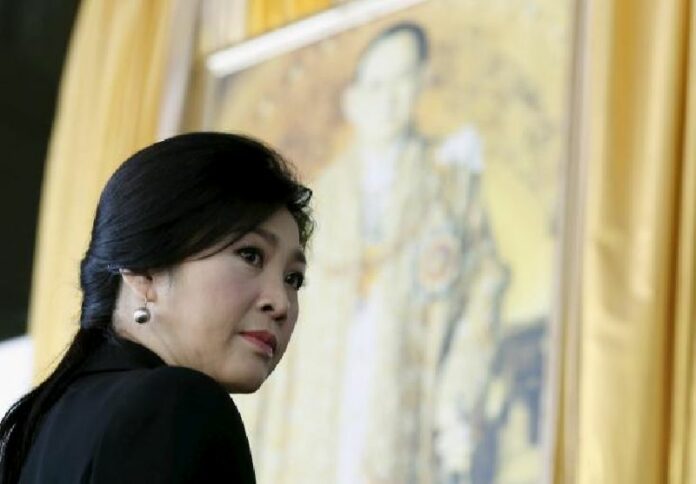 Ousted former Prime Minister Yingluck Shinawatra arrives at the criminal court today in Bangkok. Photo: Reuters / Chaiwat Subprasom<br />