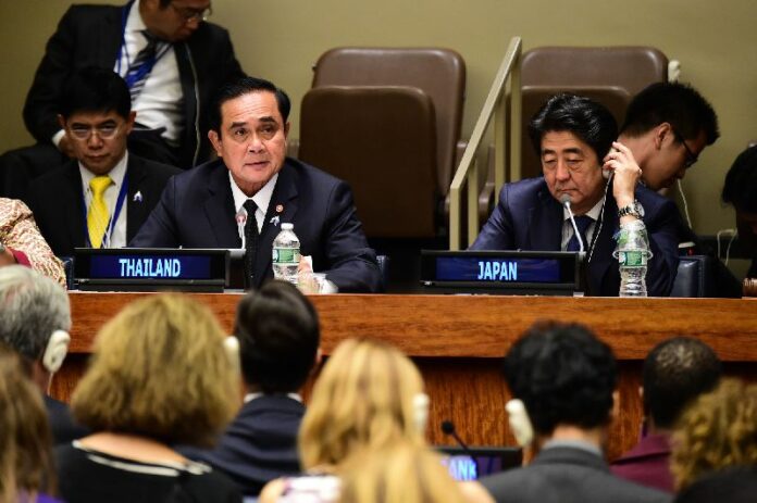 Junta chairman Prayuth Chan-ocha addresses a UN forum in New York City, 29 September, 2015. His regime is pushing ahead with a single gateway, a system with the expressed intent of monitoring all internet traffic in Thailand.