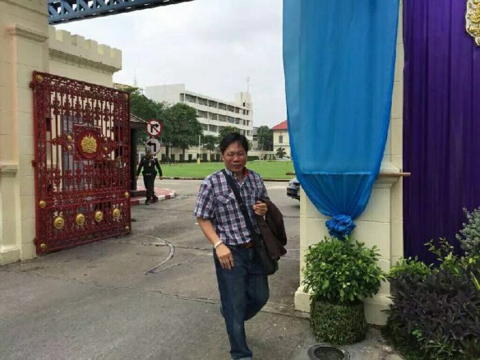 Sakda Sae-Eiaw, a cartoonist for Thai Rath newspaper who uses the pen name 'Sia Thai Rath,' after reporting to military authorities at the Royal Thai Army headquarters in Bangkok.