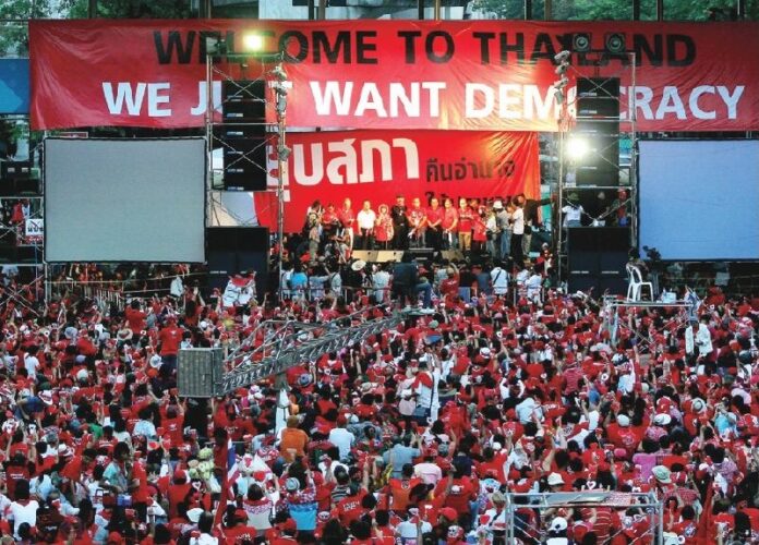 Redshirts don their red shirts at a rally at Ratchaprasong Intersection in Bangkok in this April 8, 2010, file photo.