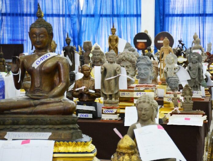 Items seized from disgraced CIB chief Pongpat Chayaphan displayed to the public Dec. 11, 2014.