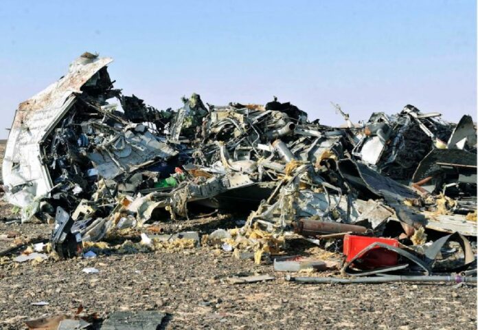 Debris from crashed Russian passenger jet lies strewn across the sand in Egypt's Sinai Peninsual on Saturday. EPA/STR